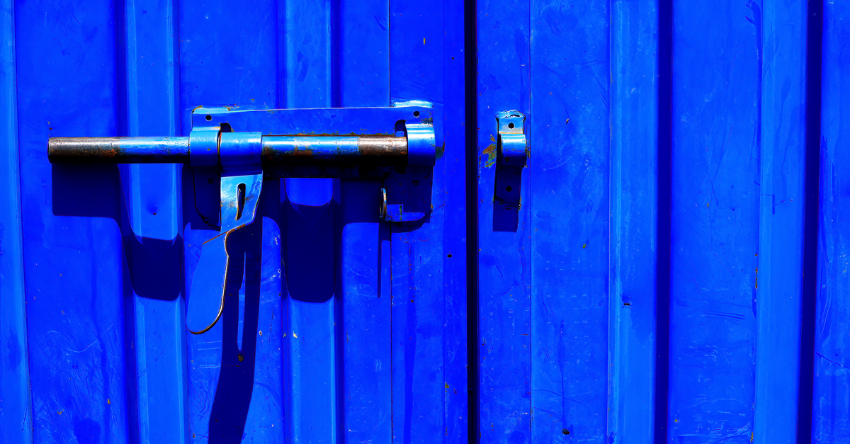 locksmith hands door — Livingston Locksmith Inc