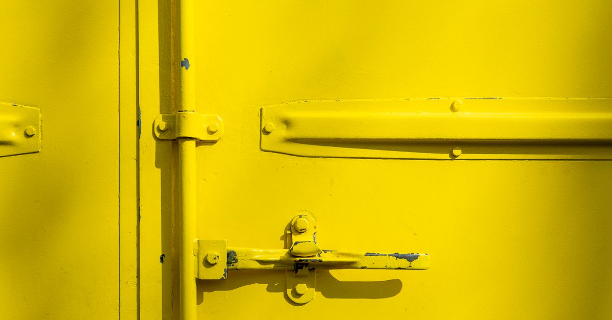 locksmith hands door — Livingston Locksmith Inc